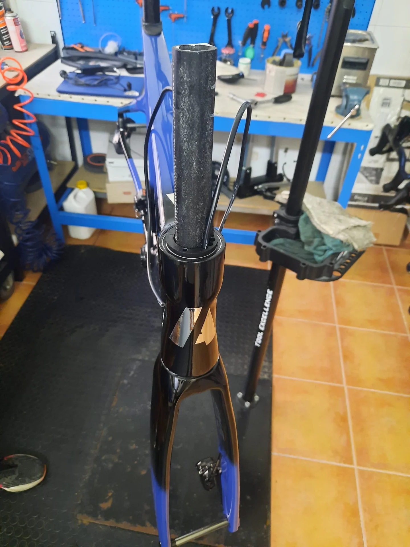 Carbon fork and steerer tube being fitted into the Argenta frame